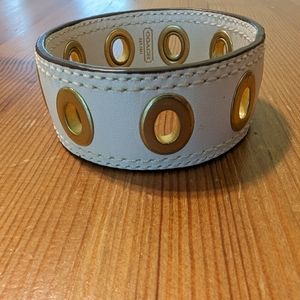 Coach White& gold Leather Grommet Bracelet. In excellent condition.